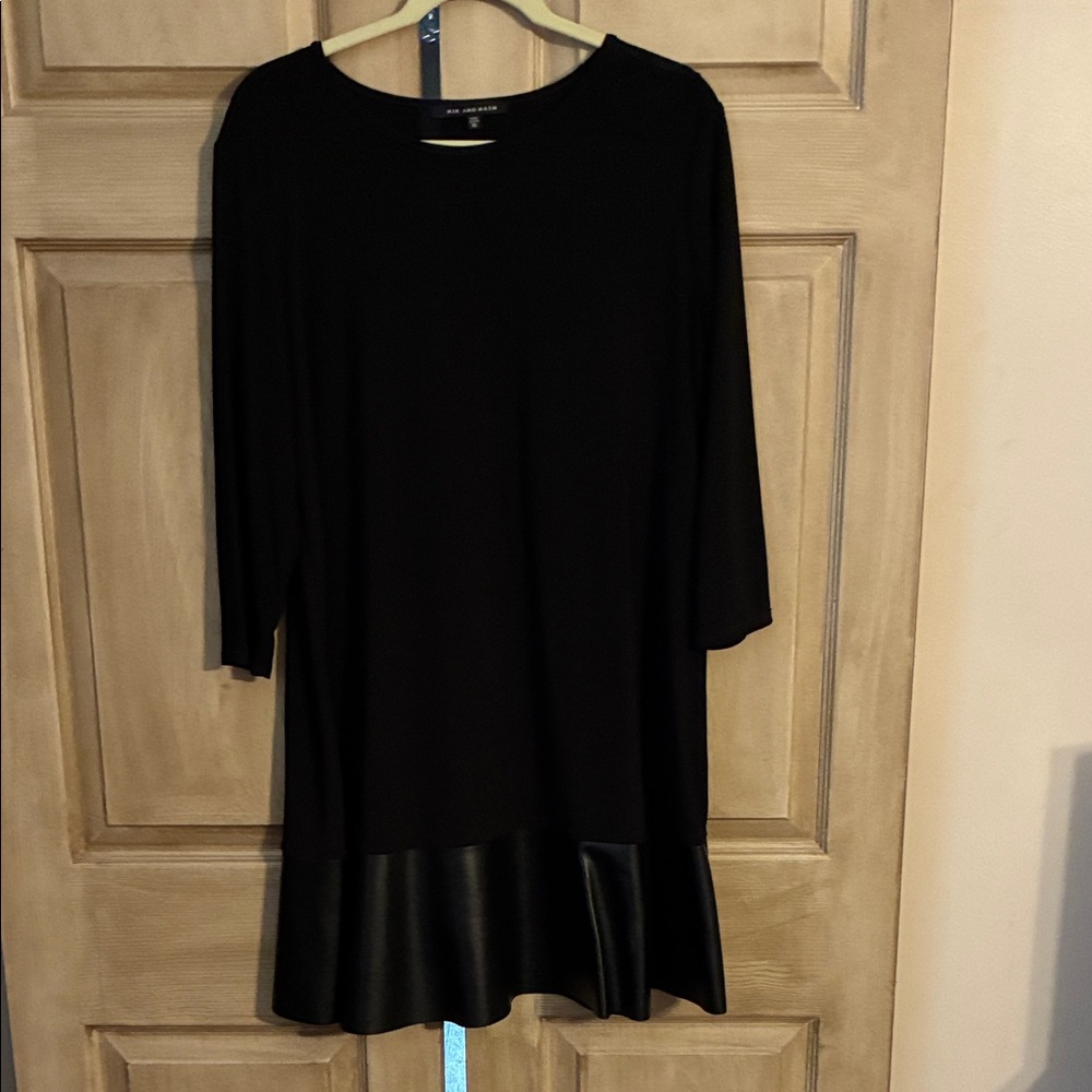 Elegant Black Dress with Faux Leather Hem